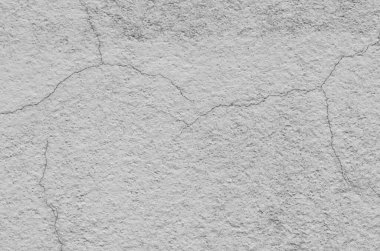 Çizgili çizgiler, soyulma ve çatlama ile desenlendirilmiş soyut eski beton duvar. Gri beton arka plan. Metin tasarımı için boşluk kopyala.