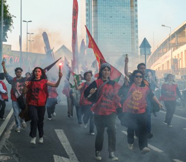 The executed Deniz Gezmis, Huseyin inan and Yusuf Aslan are commemorated on their death anniversaries. Protesters are running with torches. clipart