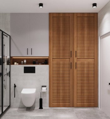 Kilerde ahşaptan yapılmış gri bir banyo var.