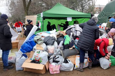 Humanitarian aid in Ukraine. Volunteers collect clothes and food for victims of Russian rocket attack on residential building. War in Ukraine, Dnipro, 2022-01-15