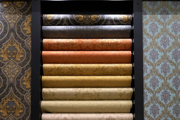 Colorful rolls of wallpaper as background, Close up wall paper, vinyl and paper, Decorative materials for renovation of room, interior in shop