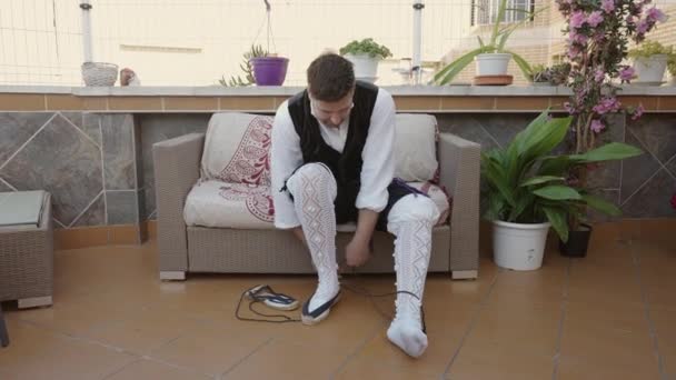 Caucasian Man Putting Shoes His Traditional Costume Spanish Traditions — Stock Video
