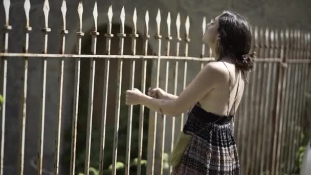 Young European Woman Holds Iron Fence Her Hands Majorca Paradisiac — Stock Video