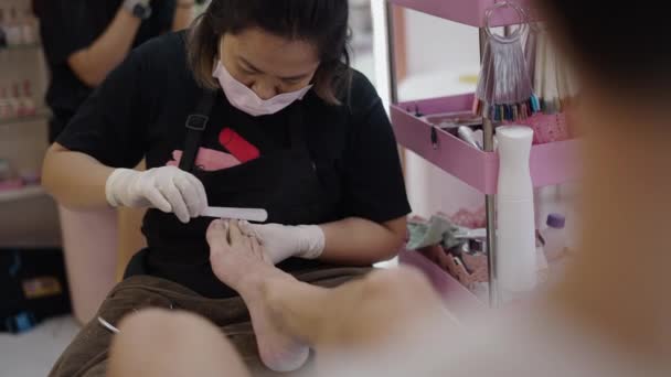 Shoulder Shot Woman Doing Pedicure Client Health Concept — Vídeo de Stock