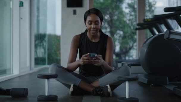 Black Woman Watching Music Video Get Motivation Sit Floor Exercising — Stock video