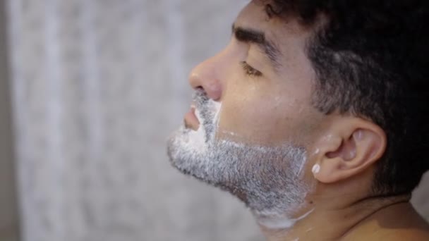 Venezuelan Guy Shaving His Neck Part Bathroom Horizontal Video Royalty Free Stock Video