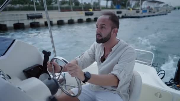 Man Beard Linen Shirt Drives Boat Luxury Lifestyle — Stock Video