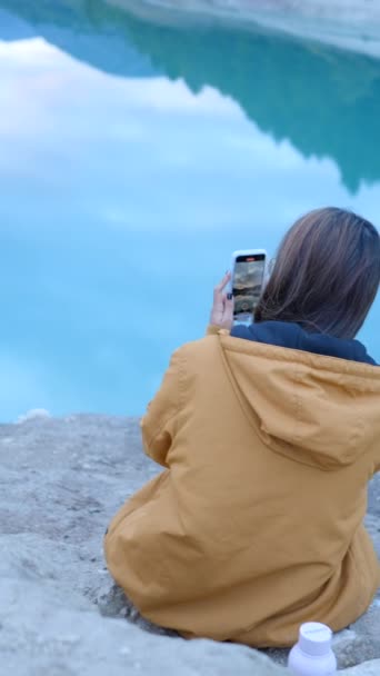 Tilt Girl Using Phone Lake Nature She Photographing Vertical Video — Stock Video