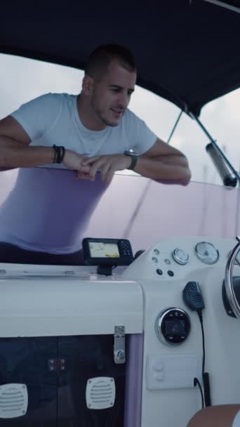 Two Men Talk Boat Something Phone Vertical Fhd Luxury Lifestyle — Stock Video