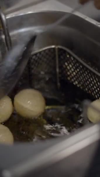 Close View Chef Using Skimmer Deep Fryer Balls Dough Fullhd — Stock Video