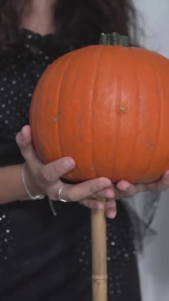 Women Witch Costume Holding Broomstick Pumpkin Halloween Medium Shot Vertical — Stock Video