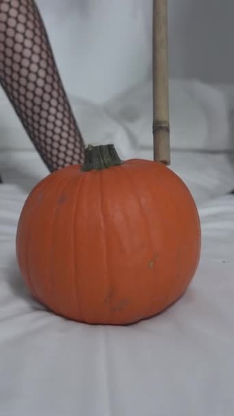 Cropped Image Women Witch Costume Standing Bed Hitting Pumpkin Broomsticks — Stock Video
