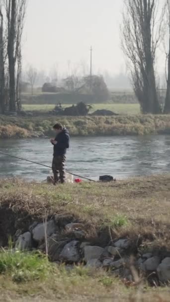 Three Fishermen Waiting Fish Bite River Fhd Vertical — Stock Video