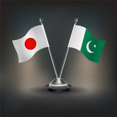 Japonya ve Pakistan bayrağı, masanın üzerinde durun. Vektör İllüstrasyonu