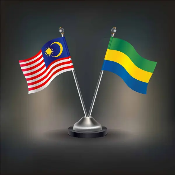 Malezya ve Gabon bayrak ilişkileri, masanın üzerinde durun. Vektör İllüstrasyonu