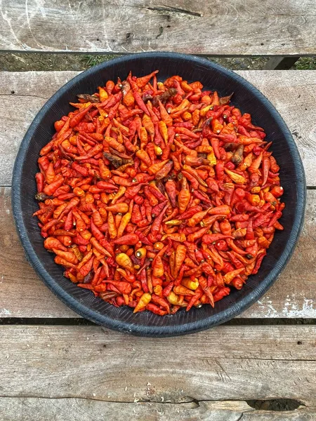 Dried Chili in Tampah. Natural food. Natural cuisine. Natural spices. Close up. From above