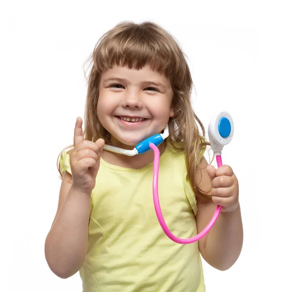 Veselé Dítě Fonendoskopem Směje Ukazuje Gesta Rukou Medicína Zdraví Koncept — Stock fotografie