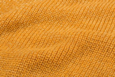 Sarı yünlü kumaş kumaş kumaşı, kumaş kıvrımlı, yan görünüm.