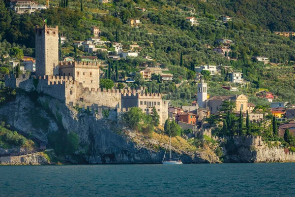 stock image Idyllic Lake Garda in Malcesine old town coastline at sunset, Italian alps