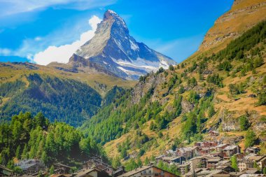 Matterhorn above zermatt pine trees woodland idyllic valley, Swiss Alps clipart
