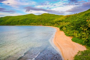 Tropical paradise, sandy beach at summer day in Fiji Islands, Pacific ocean