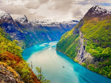 Above idyllic Geiranger fjord dramatic landscape, Norway, Scandinavia