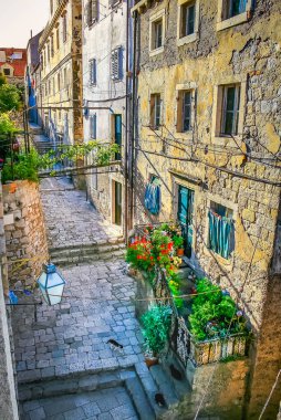 Dubrobvik medieval old town, turquoise adriatic beach in Dalmatia, Croatia