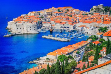 Dubrobvik medieval old town, turquoise adriatic beach in Dalmatia, Croatia