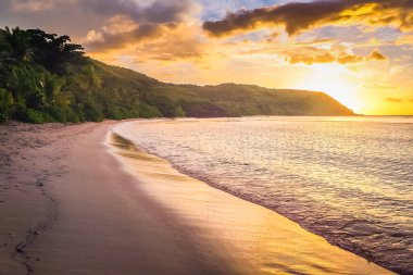 Tropical paradise, sandy beach at summer day in Fiji Islands, Pacific ocean