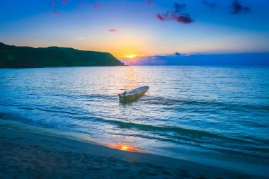Tropical paradise, sandy beach at summer sunset in Fiji Islands, Pacific ocean