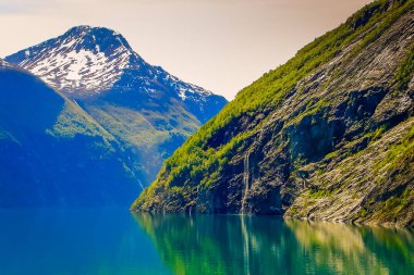 Above idyllic Geiranger fjord dramatic landscape, Norway, Scandinavia