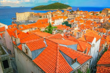 Dubrobvik medieval old town, turquoise adriatic beach in Dalmatia, Croatia
