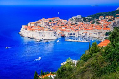 Dubrobvik medieval old town, turquoise adriatic beach in Dalmatia, Croatia