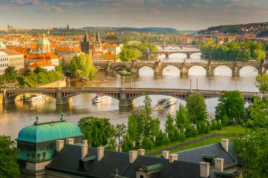 Aerial View of the the Charles Bridge and Vltava River in Prague at sunset, Czech Republic