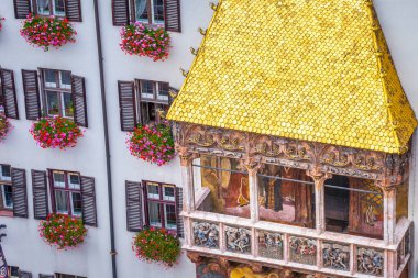 Close-up of the ornate golden roof in Innsbruck with balconies at springtime, Austria clipart