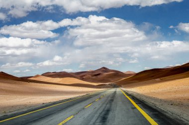 Road in Peaceful Moon Valley dramatic landscape at Sunset, Atacama Desert, Chile