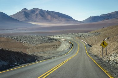 Road in Peaceful Moon Valley dramatic landscape at Sunset, Atacama Desert, Chile