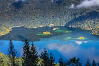 Eibsee lake from above Zugspitze at dramatic autumn landscape, Garmisch, Germany, border with Austria Tyrol