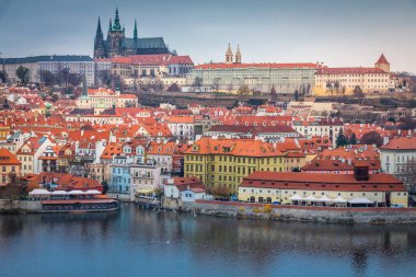 Panoramic view over the cityscape of Prague and Vltava river at dramatic sunset, Czech Republic