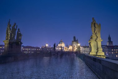 Charles Bridge in Prague, Czech Republic, at night lighting evening