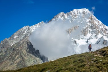 Myself hiking and enjoying the view while hiking the Tour Du Mont Blanc, Italian side