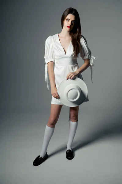 Young Girl White Hat Dress Poses Studio — Foto de Stock