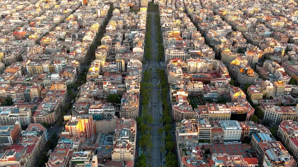 stock image Aerial view of Barcelona city skyline, Passeig de Gracia and Eixample residential district at sunrise. Catalonia, Spain