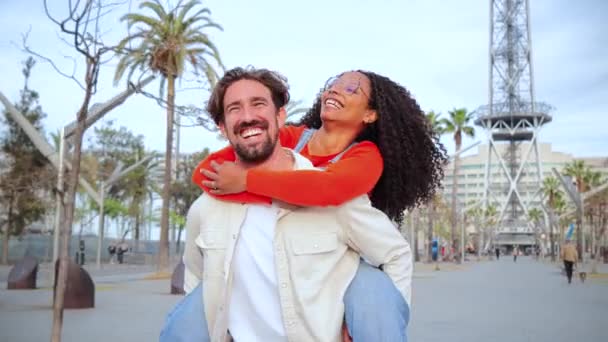 Multiracial Couple Embracing Having Fun Caucasian Man Giving His African — Stock Video