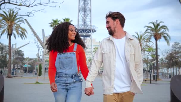 Slow Motion Young Multiracial Couple Walking Talking Laughing Holding Hands — Stock Video