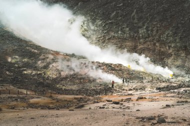 Tourism travel to Mount Io in Hokkaido, Japan. Volcano active mountain and sulfur stone.