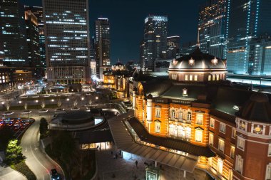 Cityscaped of Tokyo station in night time. Beautiful and old style building. Marunouchi district, Japan.