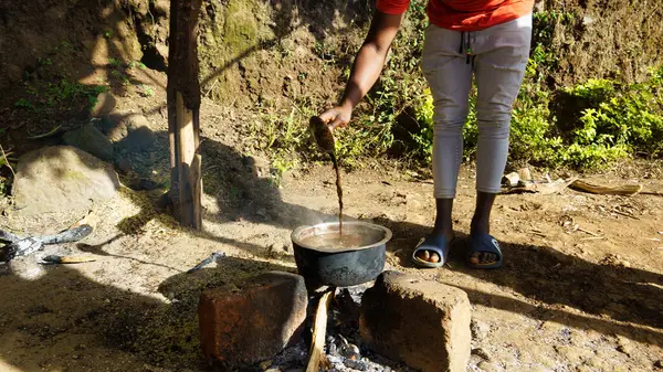 Making coffee at the African coffee farmer - African kilimanjaro tanzania coffee. High quality photo