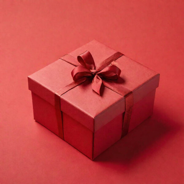 red gift box on a plain red background
