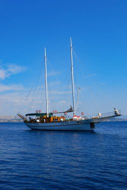 The yacht is sailing in the Adriatic Sea. A sailboat journey along the Croatian coast, Croatia.